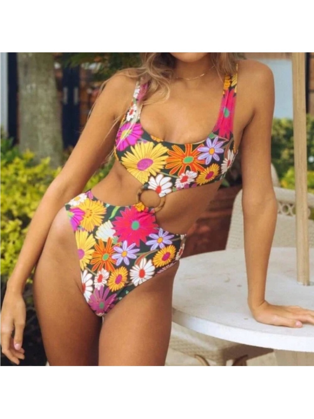 Woman’s Montce one piece swimsuit floral bathing suit cut out